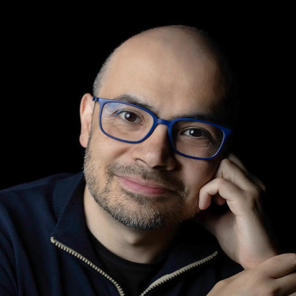 Official portrait of Demis Hassabis from the DeepMind Institute page
