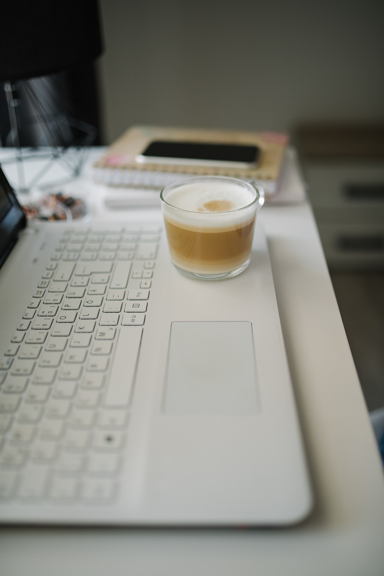 Study workspace with notebook and coffee