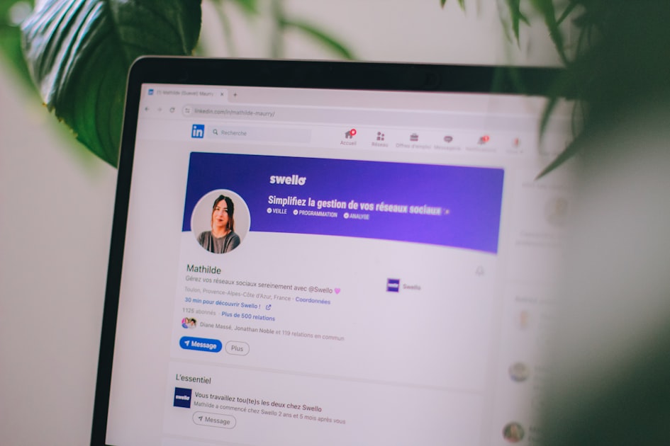 Working on LinkedIn from a laptop in a professional setting