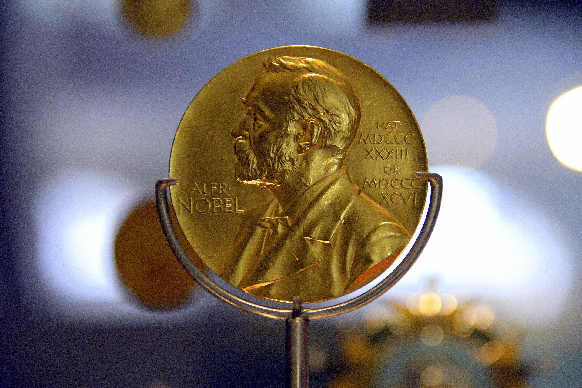 The Nobel Prize in Physiology or Medicine medal — photographed medal from 1945 on display at the National Museum of Scotland