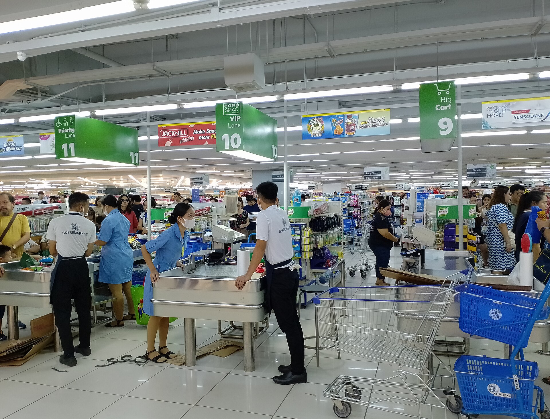 A student working part-time at a store — a common income source for international students